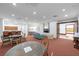 Bright community lounge area featuring tables, chairs, and a cozy seating area with a couch at 345 Bayshore Blvd # 1502, Tampa, FL 33606