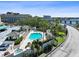 Inviting pool area surrounded by lush landscaping, gazebos, a hot tub, and nearby parking at 345 Bayshore Blvd # 1502, Tampa, FL 33606