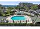 Sparkling community pool surrounded by palm trees and comfortable lounge seating at 345 Bayshore Blvd # 1502, Tampa, FL 33606