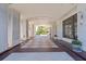 Elegant porte-cochère with patterned tile flooring providing covered access to the building entrance at 345 Bayshore Blvd # 1502, Tampa, FL 33606