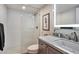 Updated bathroom featuring a modern shower, stylish vanity with granite countertop, and neutral color scheme at 350 Pinellas Bayway S # 2, St Petersburg, FL 33715