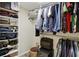 Spacious closet with organized shelving, hanging rods, and ample storage for clothing and accessories at 350 Pinellas Bayway S # 2, St Petersburg, FL 33715