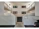 Exterior entrance of a modern condo building featuring clean lines and a minimalist design at 350 Pinellas Bayway S # 2, St Petersburg, FL 33715