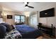 Comfortable main bedroom with a waterfront view, a work area, and neutral tones at 350 Pinellas Bayway S # 2, St Petersburg, FL 33715