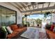 Inviting covered porch with comfortable seating and views of the water at 350 Pinellas Bayway S # 2, St Petersburg, FL 33715