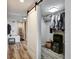 Well-organized walk-in closet with custom shelving, hanging space, and hardwood floors at 350 Pinellas Bayway S # 2, St Petersburg, FL 33715