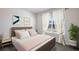 Cozy bedroom with natural light from the window and minimalist décor at 35138 Valley Ridge Rd, Dade City, FL 33525