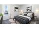 Comfortable bedroom with a large window, modern art, and neutral décor at 35138 Valley Ridge Rd, Dade City, FL 33525