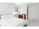 Bright and airy bedroom with a clean aesthetic and abundant natural light at 3615 W Kensington Ave, Tampa, FL 33629
