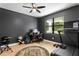 Office features hardwood floors, a large window and a view of the outdoors at 3615 W Kensington Ave, Tampa, FL 33629