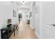 Inviting foyer with hardwood floors and a view into the spacious living areas at 3615 W Kensington Ave, Tampa, FL 33629