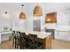 Bright, spacious kitchen with stainless steel appliances, granite countertops, and custom hood vent at 3615 W Kensington Ave, Tampa, FL 33629