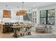 Open-concept kitchen with stainless steel appliances and natural light at 3615 W Kensington Ave, Tampa, FL 33629