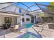 Outdoor pool and patio featuring a spa and waterfall feature at 3615 W Kensington Ave, Tampa, FL 33629