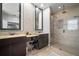Spacious bathroom with a double vanity and glass shower, offering a spa-like retreat at 3633 Cordgrass Dr, Valrico, FL 33596