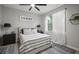 Bedroom with white bedding and window sheers at 3633 Cordgrass Dr, Valrico, FL 33596