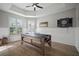 Bonus room with ceiling fan, recessed lighting, and wainscotting, offering flexible space at 3633 Cordgrass Dr, Valrico, FL 33596