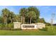 Elegant stone sign marking the entrance to the River Hills golf and country club community at 3633 Cordgrass Dr, Valrico, FL 33596