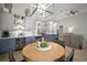 Open concept eat-in kitchen with custom cabinetry, wine refrigerator, and breakfast bar perfect for entertaining at 3633 Cordgrass Dr, Valrico, FL 33596