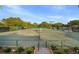 View of multiple tennis courts from an elevated vantage point at 3633 Cordgrass Dr, Valrico, FL 33596