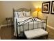 Comfortable bedroom with carpet, lamp, and bench at 3709 Gallagher Rd, Plant City, FL 33565