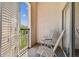 Relaxing balcony with comfortable seating and views of the community at 402 S Armenia Ave # 137, Tampa, FL 33609