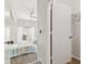 A bedroom with balcony access through white curtains, creating a serene and airy atmosphere at 402 S Armenia Ave # 137, Tampa, FL 33609