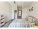 Comfortable bedroom leading to a bathroom and a closet, creating a convenient and private retreat at 402 S Armenia Ave # 137, Tampa, FL 33609