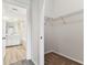 Spacious walk-in closet with built-in shelving, providing ample storage and organization options at 402 S Armenia Ave # 137, Tampa, FL 33609