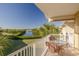 Balcony featuring a water view and a wicker table and chairs set at 418 Bahia Beach Blvd, Ruskin, FL 33570