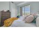 Bedroom featuring a bright window to the outside and neutral colors at 418 Bahia Beach Blvd, Ruskin, FL 33570