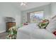Main bedroom with a bright window to the outside world and tropical-themed decor at 418 Bahia Beach Blvd, Ruskin, FL 33570