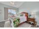 Bedroom with a tropical theme and sliding glass doors to the outside at 418 Bahia Beach Blvd, Ruskin, FL 33570