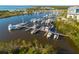 Scenic marina view featuring multiple yachts and boats docked along piers in a tranquil harbor setting at 418 Bahia Beach Blvd, Ruskin, FL 33570
