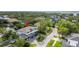 Aerial view of a two-story home backing up to a canal and surrounded by lush landscaping at 4806 W San Rafael St, Tampa, FL 33629