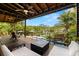 Spacious outdoor deck overlooking a canal with lush landscaping and a resort style pool at 4806 W San Rafael St, Tampa, FL 33629