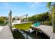Scenic view of a private boat dock with lift, offering easy access to the water at 4806 W San Rafael St, Tampa, FL 33629