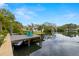 Waterfront property with a private boat dock and lift, perfect for boating enthusiasts at 4806 W San Rafael St, Tampa, FL 33629