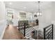 Hallway with hardwood floors leading to various rooms at 4806 W San Rafael St, Tampa, FL 33629