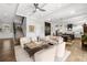 Open-concept living room and kitchen with hardwood floors and elegant decor throughout at 4806 W San Rafael St, Tampa, FL 33629
