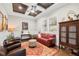 Cozy living room with rich wood ceiling, comfortable furniture, and unique decor at 4806 W San Rafael St, Tampa, FL 33629