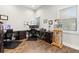Well-lit home office with multiple workstations and ample natural light at 4806 W San Rafael St, Tampa, FL 33629