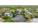 Waterfront home showcasing the backyard, boat dock, and peaceful water views at 4806 W San Rafael St, Tampa, FL 33629