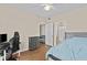 Comfortable bedroom with hardwood floors, perfect for relaxing or setting up a home office space at 5125 Palm Springs Blvd # 11306, Tampa, FL 33647