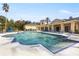 Resort-style community pool with ample seating, palm trees, and well-maintained surroundings at 5125 Palm Springs Blvd # 11306, Tampa, FL 33647