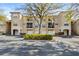 Charming multi-Gathering building featuring private garages, balconies, and beautifully maintained landscaping at 5125 Palm Springs Blvd # 11306, Tampa, FL 33647