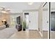 Bright foyer with tile flooring, a ceiling fan, and views into the living area, creating a welcoming entrance at 6208 Imperial Ky, Tampa, FL 33615