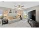 Bright living room with ceiling fan, comfortable seating, and lots of natural light at 6208 Imperial Ky, Tampa, FL 33615