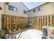 Cozy back patio featuring a wood fence providing privacy, perfect for outdoor relaxation and container gardening at 6262 142Nd N Ave # 1304, Clearwater, FL 33760