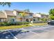 Attractive townhomes with well-maintained landscaping and convenient parking, showcasing curb appeal at 6262 142Nd N Ave # 1304, Clearwater, FL 33760